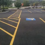 Example of ADA compliant striping in a parking lot, including handicap spots.