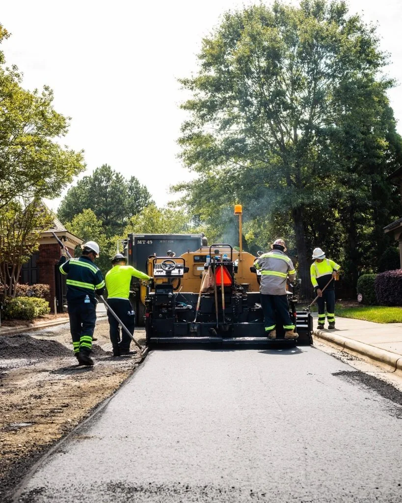 carolina asphalt workers asphalt paving a roadway